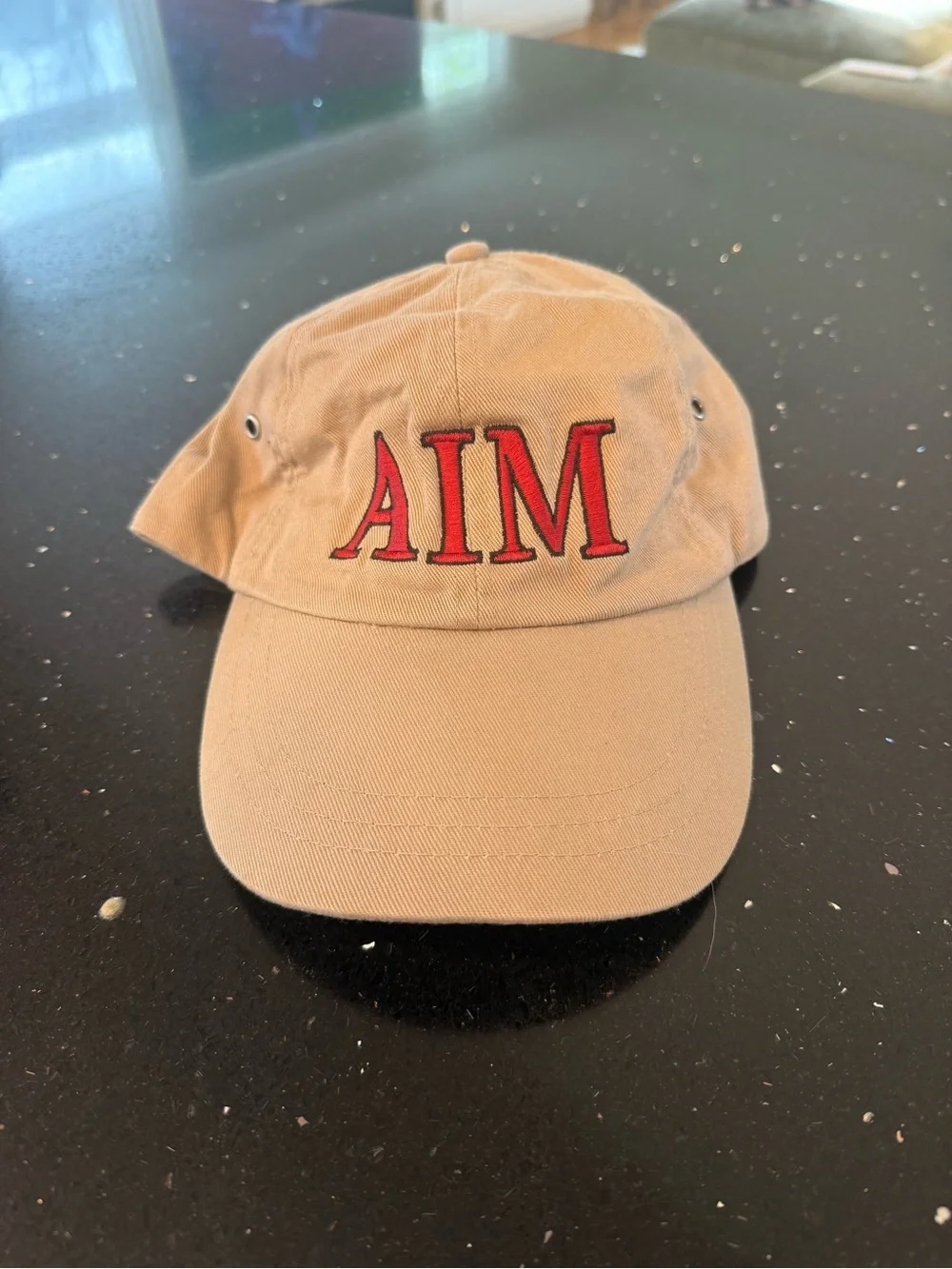 Beige 'AIM' Embroidered Baseball Cap - Red Logo